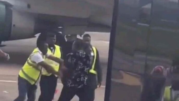 VIDEO: Chaos as Enugu Air officials forcibly deplane passenger