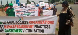 CSOs protest at CBN HQs, accuse Sterling Bank of fraud, exploiting customers