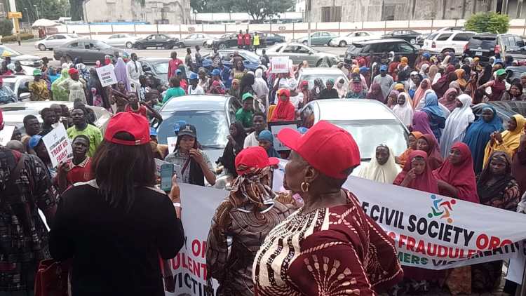 CSOs protest at CBN HQs, accuse Sterling Bank of fraud, exploiting customers